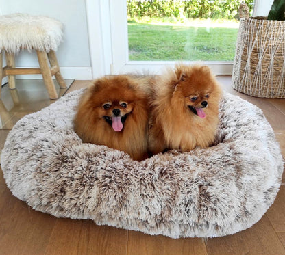 Coussin ovale imitation fourrure