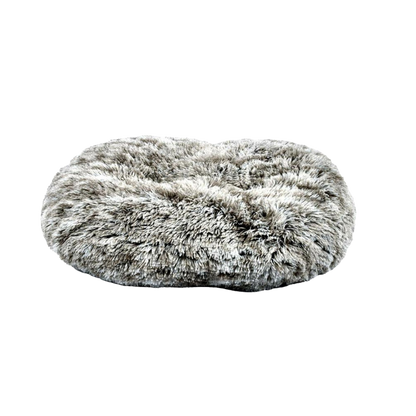 Coussin ovale imitation fourrure