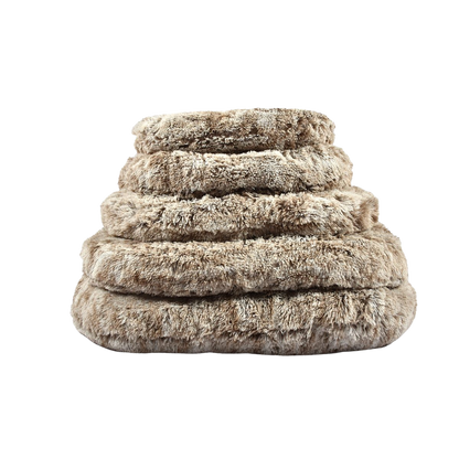 Coussin ovale imitation fourrure